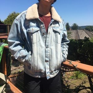 Distressed denim jacket